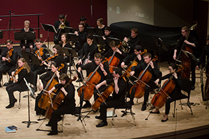 Whitman College's orchestra performing in the Hall of Music.