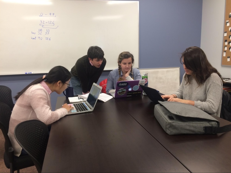 students studying together in the computer science commons area