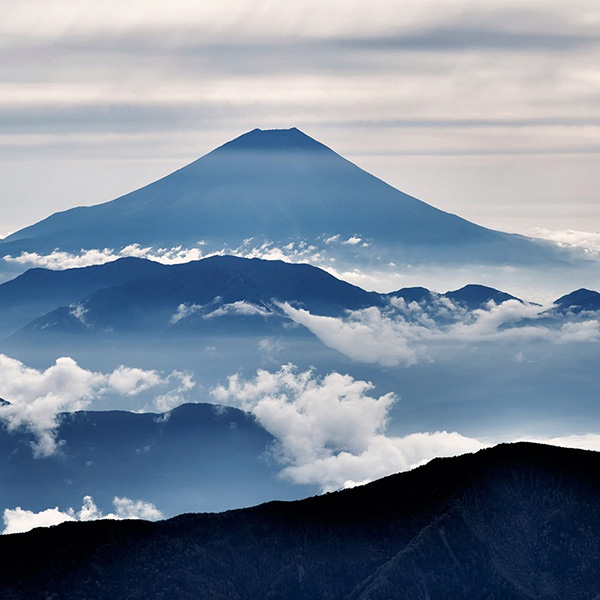 Mountain surrounded by fog.