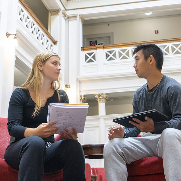 Teacer and student talking.