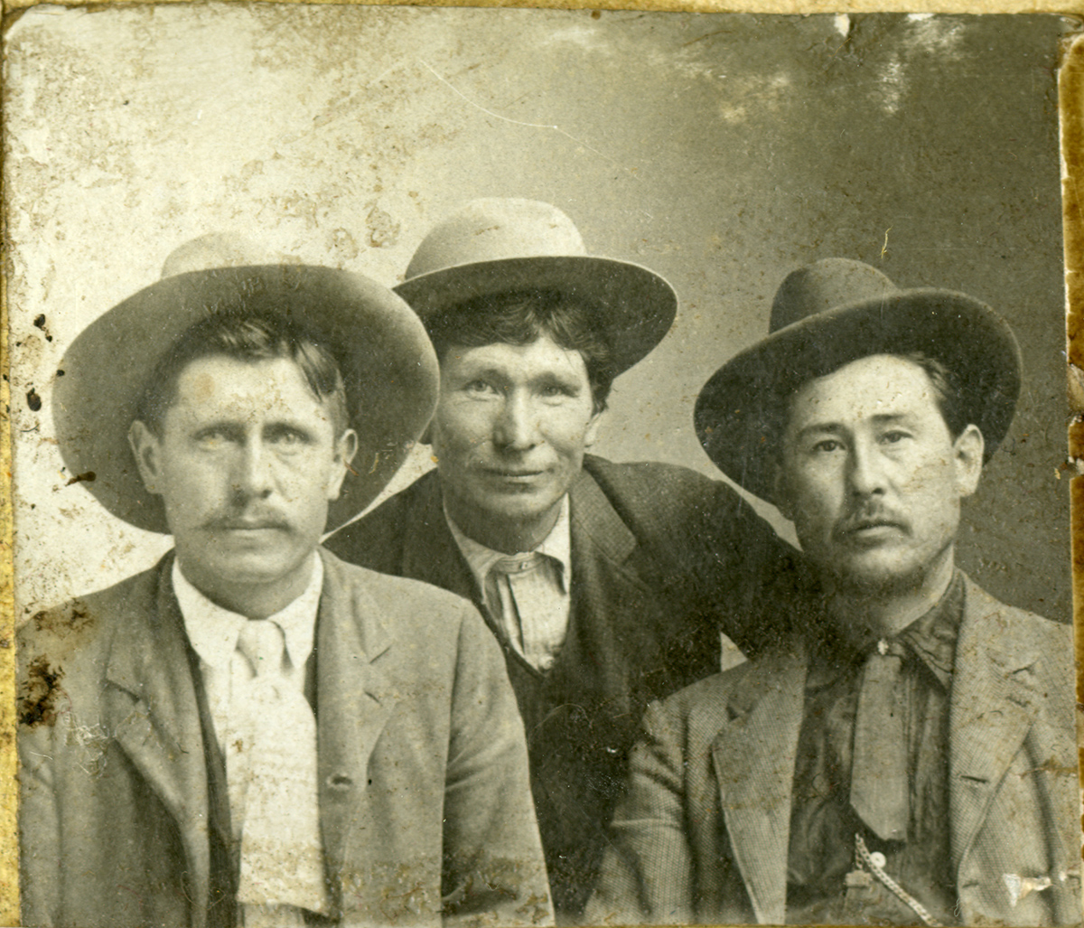 Old photograph of three men.