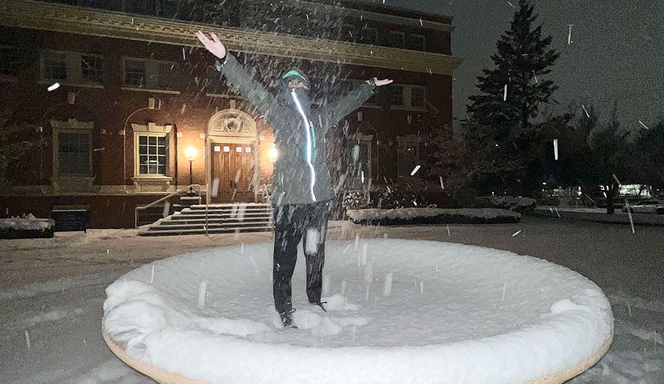 Students playing in the snow.