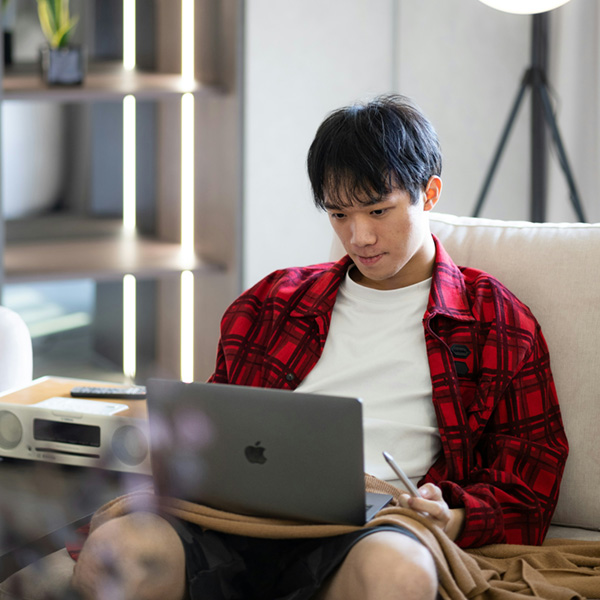 A student at home participating in a Whitman College virtual enrollment interview.