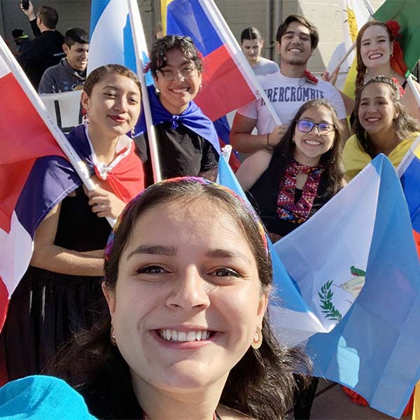 Marian Sandoval Lemus selfie with crowd.