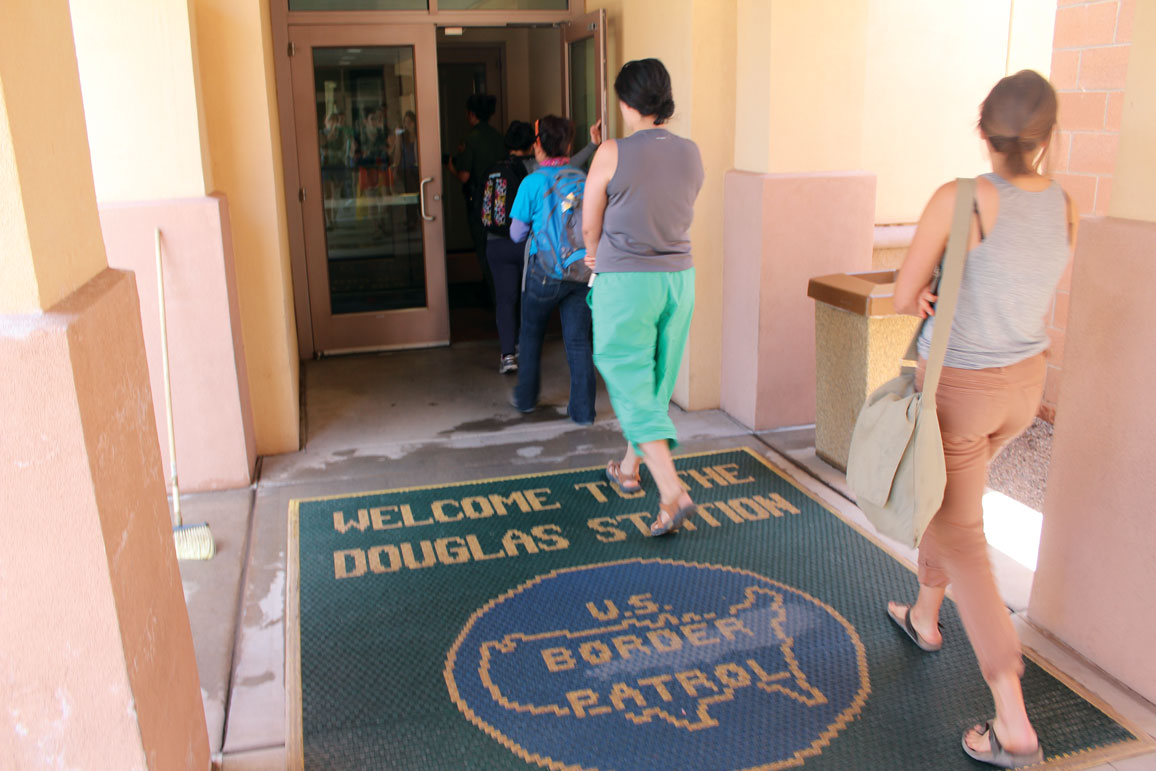 Ashley Hansack and Leslie Rodriguez walk into the U.S. Border Patrol building in Douglas, Arizona.