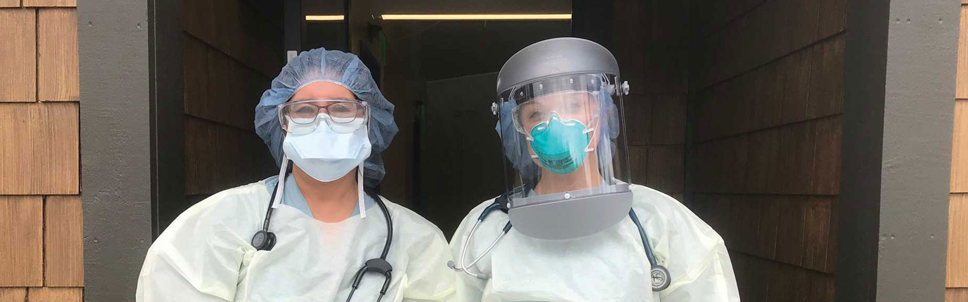 Whitman College Alumni healthcare workers wearing protective masks