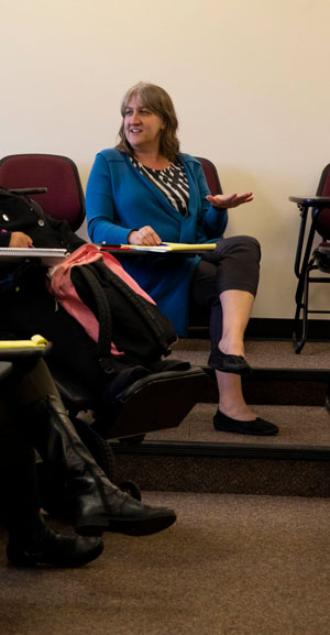 Sociology Professor Michelle Janning talks with the class in October.