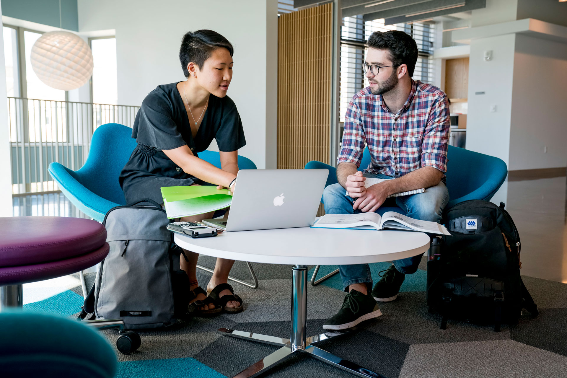 KC Cook '20 and Kieran Lenssen '20 discuss a project.