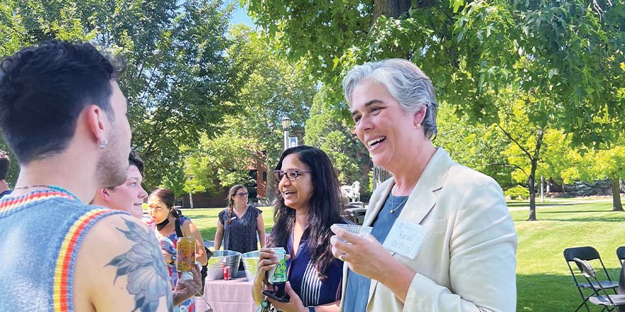 Sarah Bolton meeting students outside.