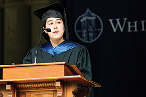 Amber Ebarb speaks from a podium.