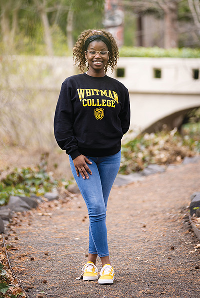 Kanesha Johnson smiling outdoors.