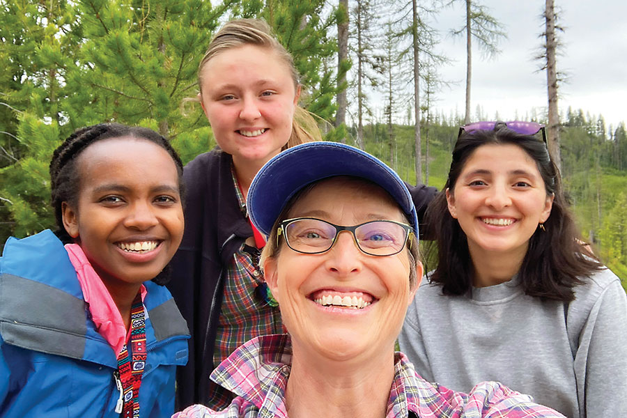 (left to right) Wamuchii Mwangi ’24, Namy Barnett ’23, and Mehrimo Bakhtalieva ’25, have gained valuable experience through their fieldwork with Professor of Geology Kirsten Nicolayson.