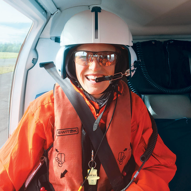 Erica Goad in a helicopter.