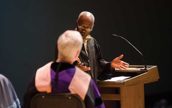 Kazi Joshua addresses an audience.