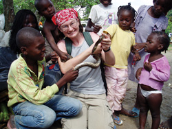 Jackson showing a juvenile python to a group of children