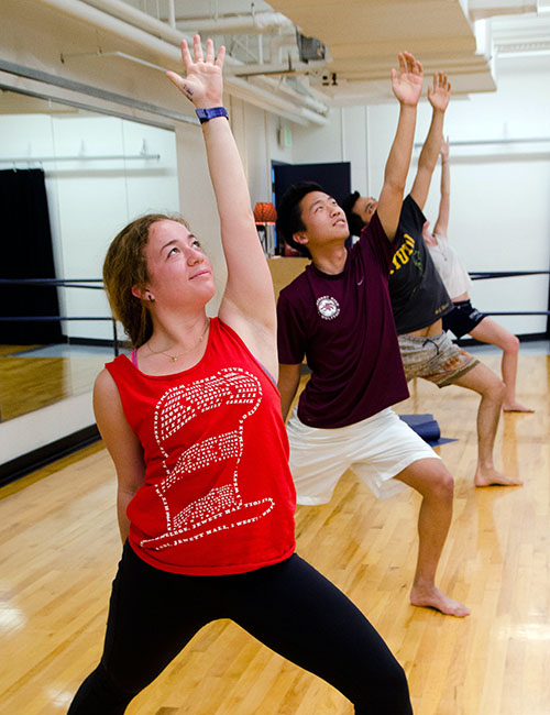 Faculty and staff doing yoga