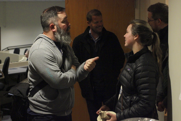 Rick Turoczy '93 chats with a student during his presentation on campus