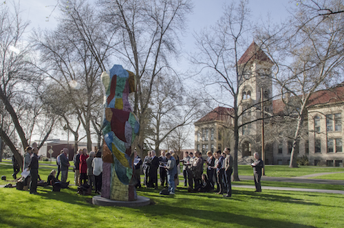 Participants engage in a Heideggerian interpretation of Jim Dine’s "Carnival" in front of the 1997 sculpture on the Whitman campus. 