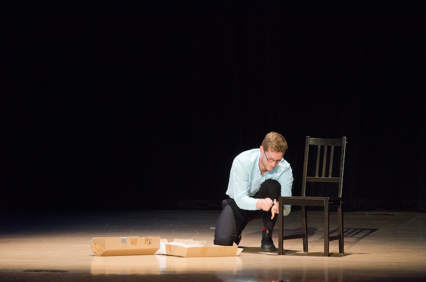 Blair assembles a wooden chair on stage as his talent. 
