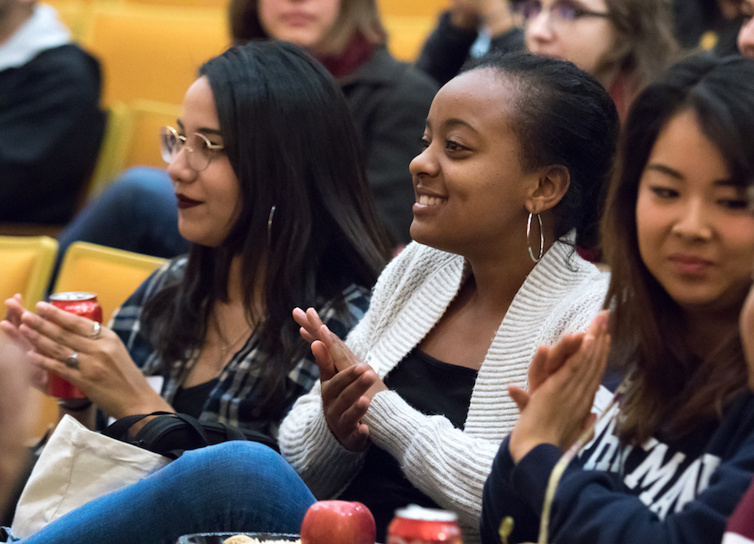Left to right: Mayra Castaneda ’19, a sociology major; Adyiam Kimbrough ’19, a politics major; and Danielle Hirano ’19, a rhetoric studies major, applaud a performance by the Testostertones, an all-male a cappella group at Whitman.