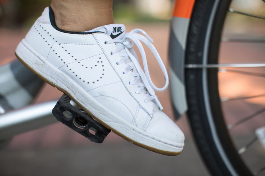 “I’m on a Nike bike and wearing my favorite shoe, the Tennis Classic Ultra Sneaker,” she says, “because it is comfortable and goes with everything.”