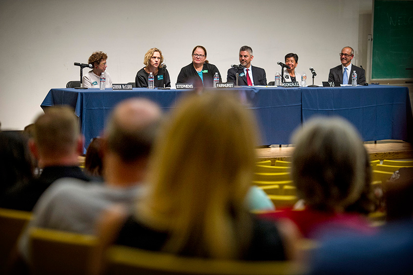 Whitman College students, faculty and Walla Walla community members listen intently to five of Washington’s highest-ranking judges during a panel discussion that took place September 10 on campus at Cordiner Hall. Pictured, from left, are Justice Sheryl Gordon McCloud, Justice Debra L. Stevens, Chief Justice Mary E. Fairhurst, Justice Steven E. González and Justice Mary I. Yu. Politics Professor Paul Apostolidis (far right) moderated. Photo by Greg Lehman