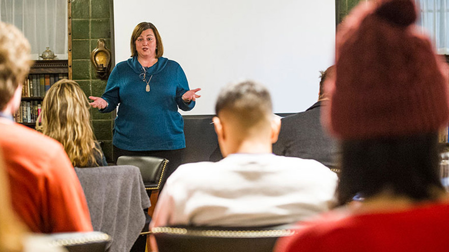 Danielle Garbe Reser speaks to a room of Whitman College students.