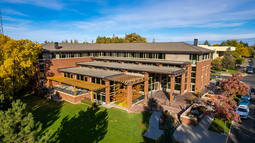 Photo of Reid Campus Center with bright blue sky in the background