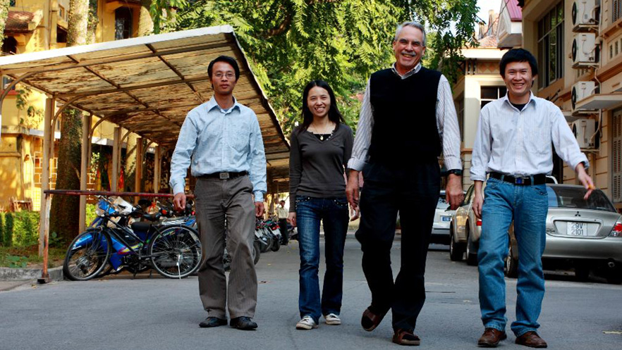 David Dennis with NIHE Colleagues in Hanoi