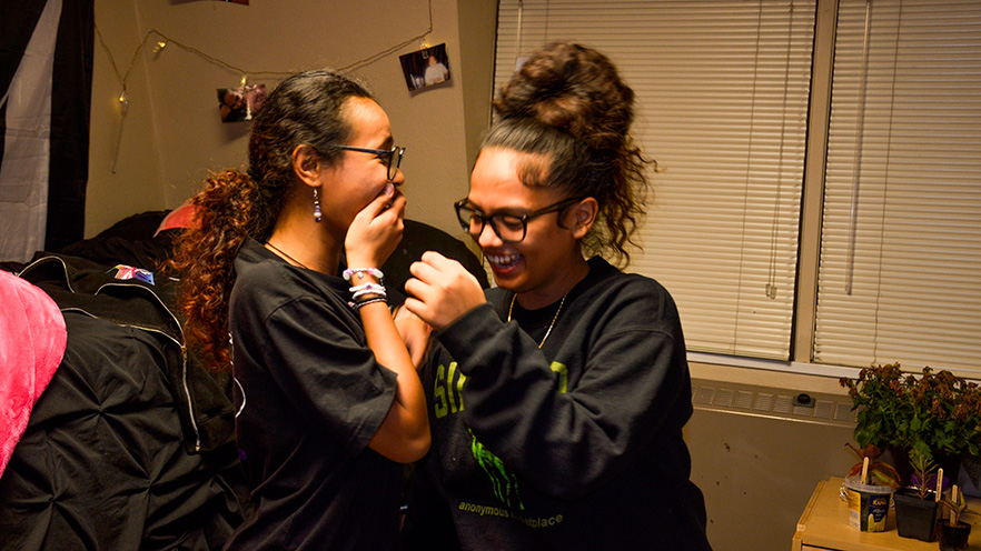 Zizia and Layla laughing together.