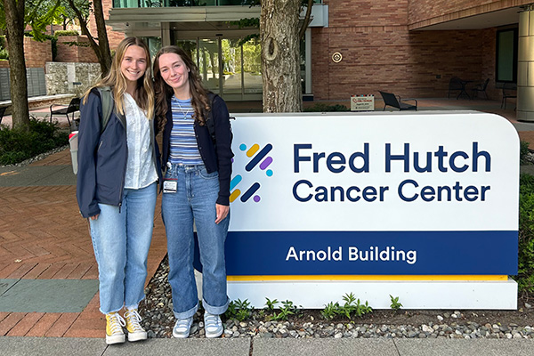 Ella Schneider ’25 (left) and Kenzie Bay ’25 (right) at Fred Hutch Cancer Center in Seattle.