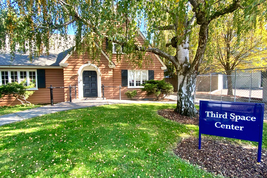 The Third Space Center sign in front of the Third Space Center house.