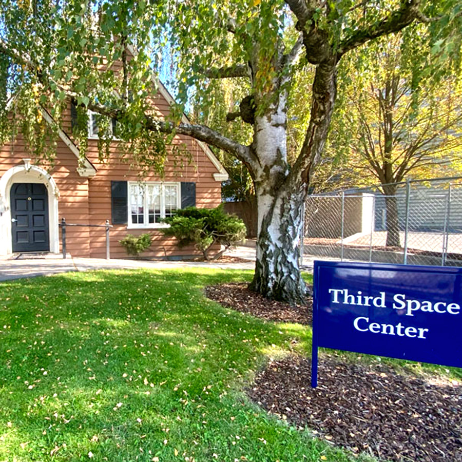 The Third Space Center sign in front of the Third Space Center house.