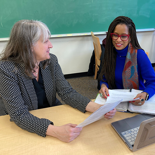 Whitman College faculty member Michelle Janning and student Lu Austin in discussion.