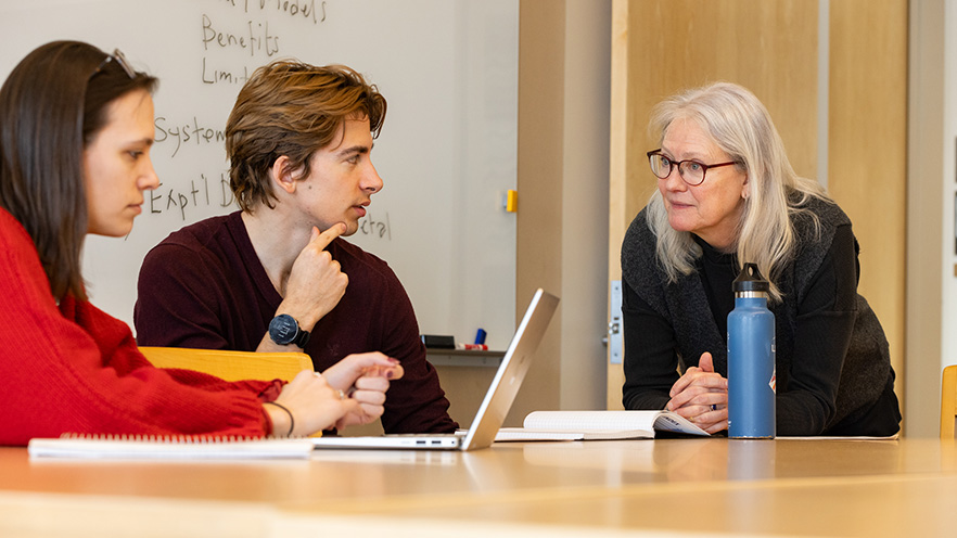 Whitman College students meeting with Professor of Biology Ginger Withers.