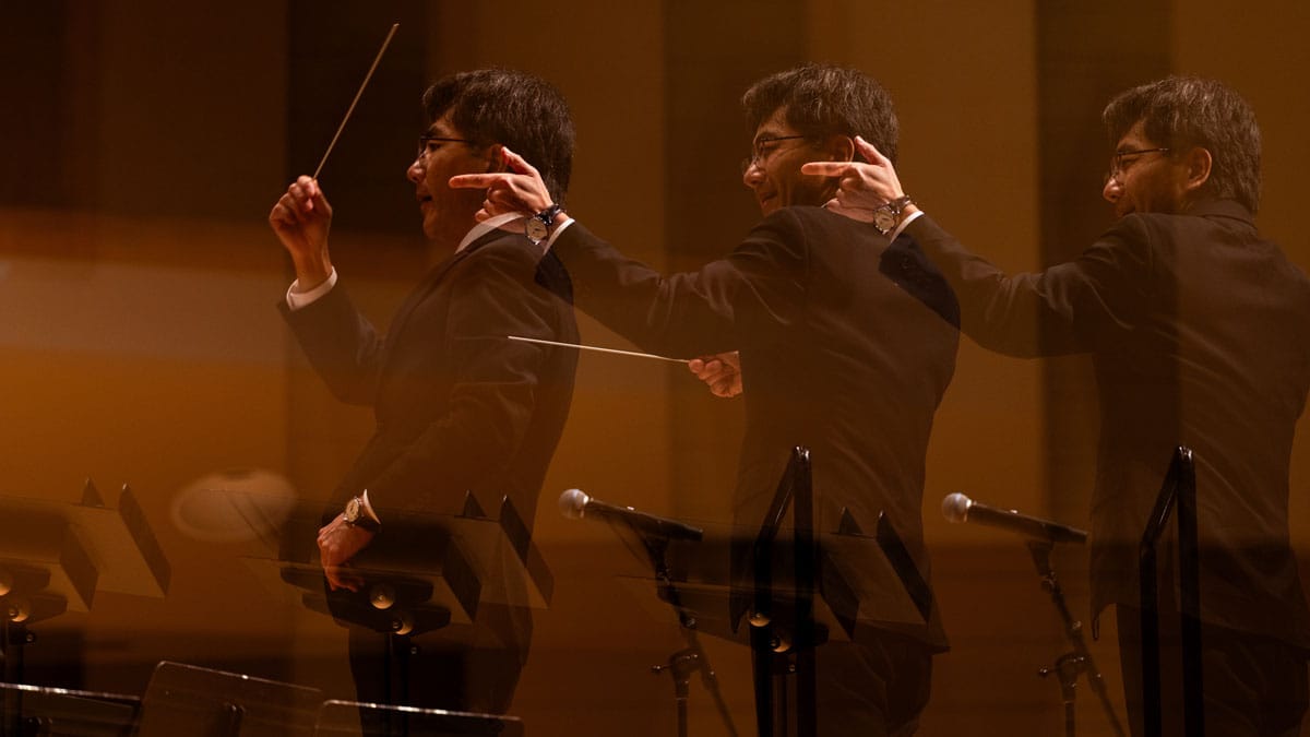 Visiting Assistant Professor of Music Susumu Watanabe directs the Wind Ensemble Fall Concert in the Hall of Music’s Chism Recital Hall on Nov. 21.