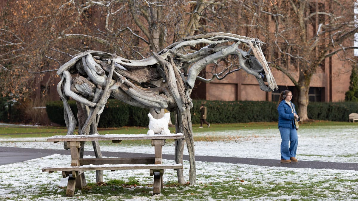 A small replica of Styx made out of snow stands on a table next to the iconic Whitman sculpture after the first snow of the season on Dec. 13.