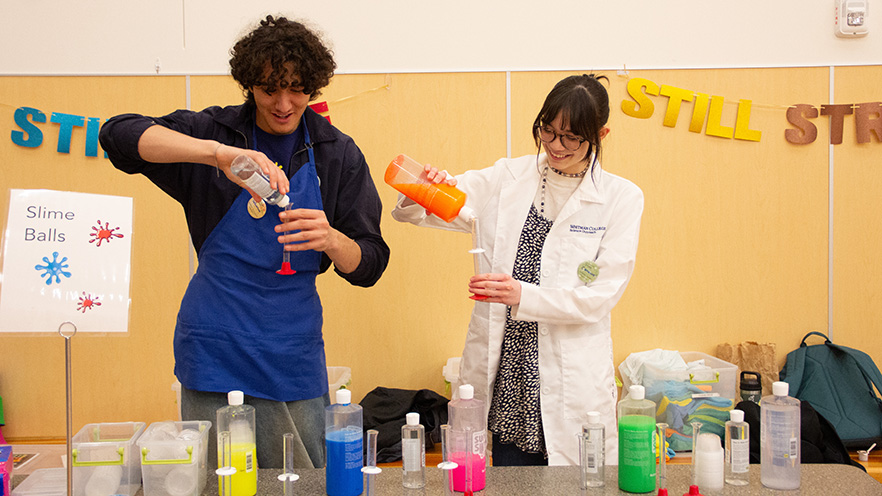 Whitman College students prepping a mixture for slime balls.