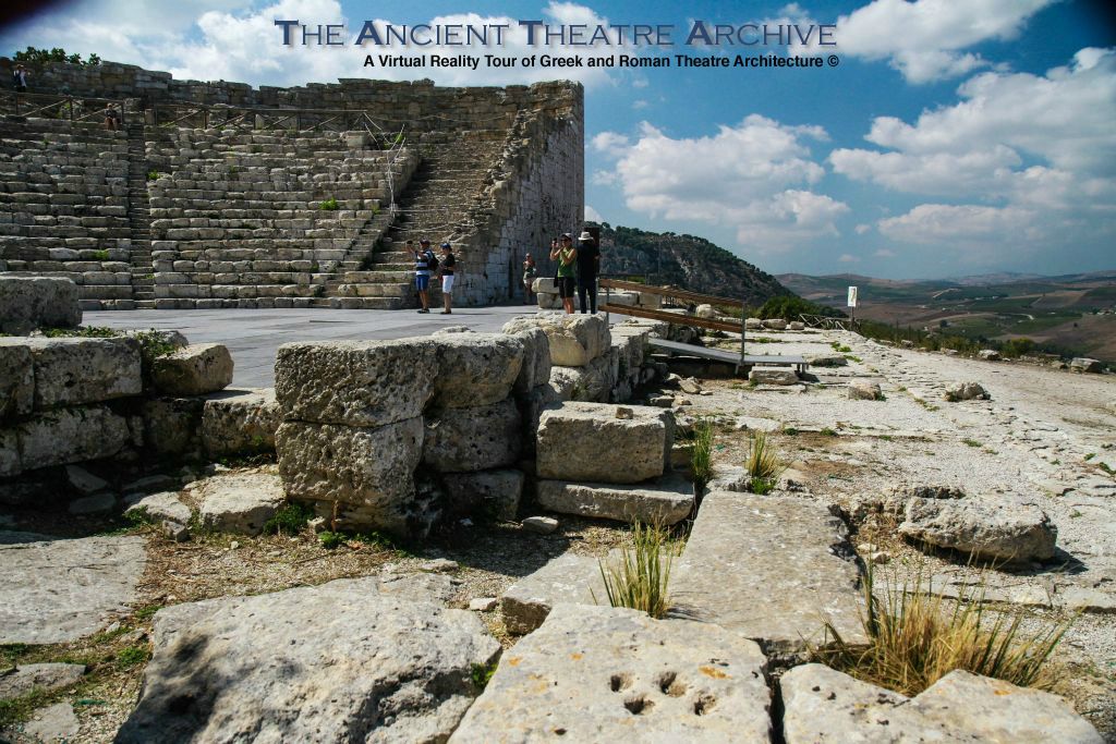 Segesta Theatre: View of scene building foundation and orchestra. The scene building (once decorated with scenes connected to the pastoral god Pan), and entrances (paradoi) on either side have been lost. Photo: T. Hines, 2019.